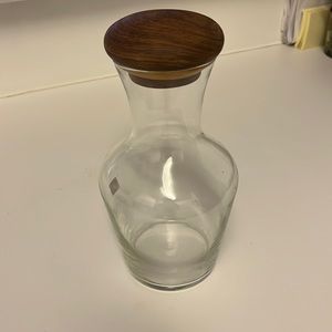 Vintage glass juice decanter with teakwood stopper.
